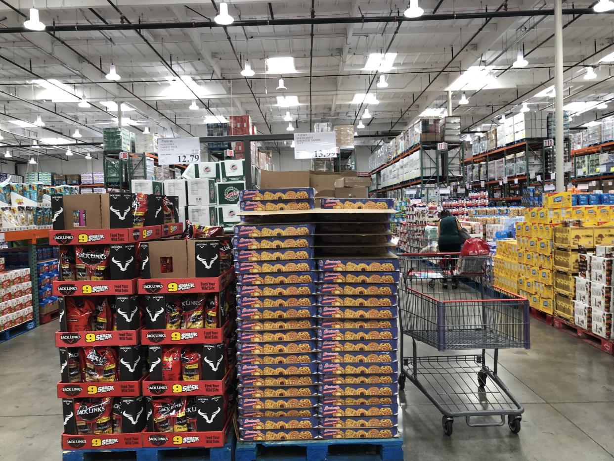 The snack section of a Costco Business Center shows products such as beef jerky, cookies, and more