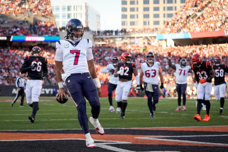 Houston Texans quarterback C.J. Stroud (7) runs into the end zone for a touchdown in the fourth quarter of the NFL Week 10 game between the Cincinnati Bengals and the Houston Texans at Paycor Stadium in downtown Cincinnati on Sunday, Nov. 12, 2023.