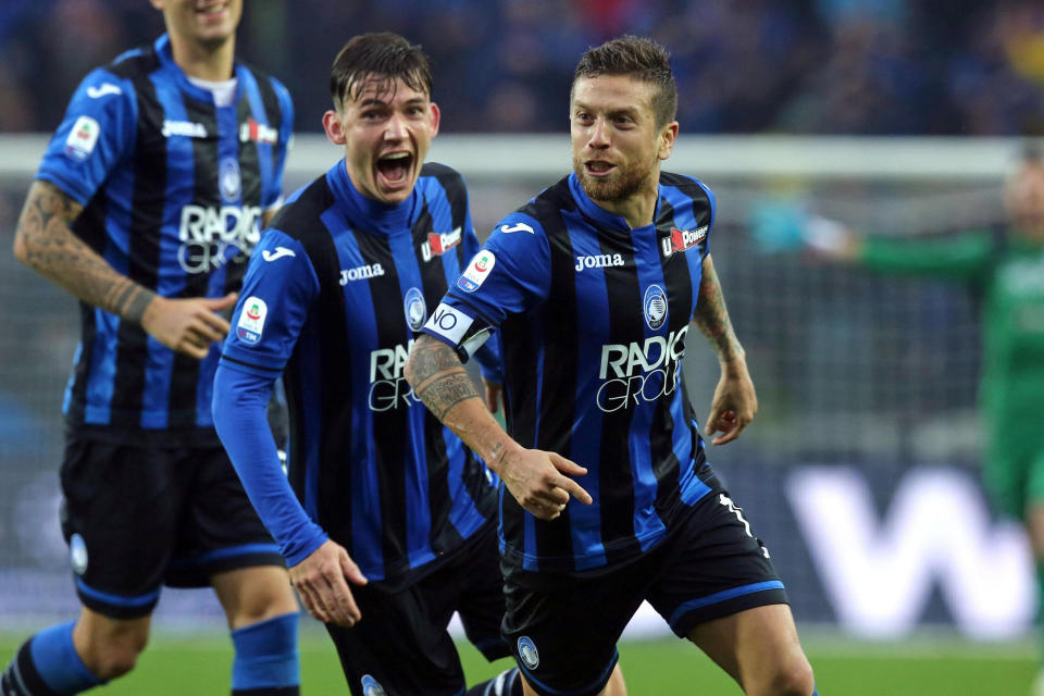 Atalanta's Alejandro Dario Gomez, right, celebrates after scoring his side's 4th goal during the Serie A soccer match between Atalanta and Inter Milan, in Bergamo, Italy, Sunday, Nov. 11, 2018. (Paolo Magni/ANSA via AP)