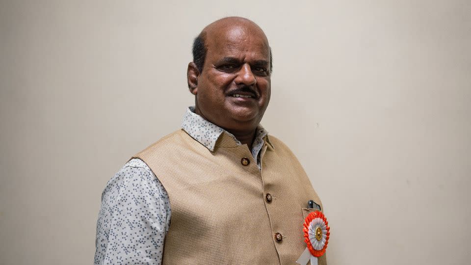 Dilip Gabekar, 60, poses for a picture during an interview with CNN at Manohar Joshi College in Dharavi on April 14. - Noemi Cassanelli/CNN