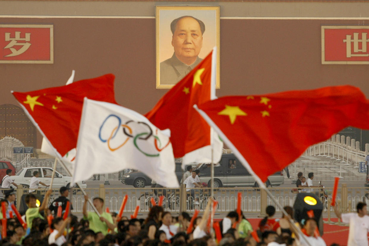 The portrait on Mao on Tiananmen Gate lo (Peter Parks / AFP via Getty Images file)