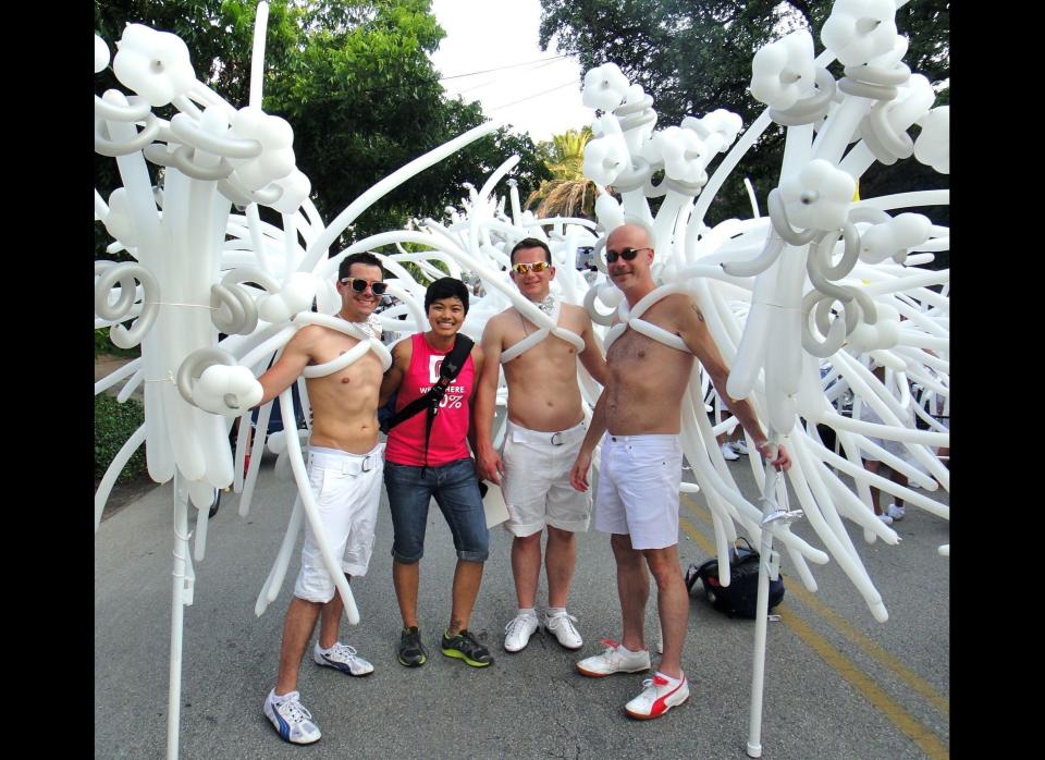 Melanie Pang (in pink) taking a photo with the men (and "noodles") of Jenni's Noodle House, a Houston favorite. 