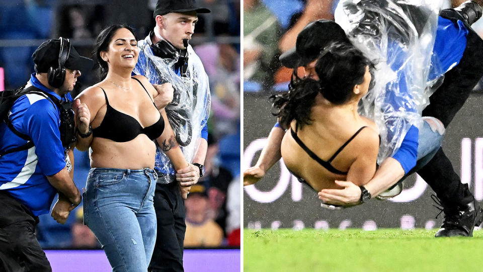 The pitch invader, pictured here being taken down in a huge hit from the security guard.