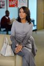 <p>Olivia Pope keeps controversy at bay in sharp suits and no-nonsense neutrals, always paired with a killer bag.</p>