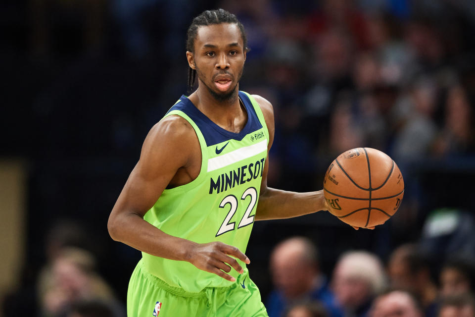 MINNEAPOLIS, MN - MARCH 30: Andrew Wiggins #22 of the Minnesota Timberwolves dribbles the ball against the Philadelphia 76ers during the game on March 30, 2019 at the Target Center in Minneapolis, Minnesota. NOTE TO USER: User expressly acknowledges and agrees that, by downloading and or using this Photograph, user is consenting to the terms and conditions of the Getty Images License Agreement. (Photo by Hannah Foslien/Getty Images)