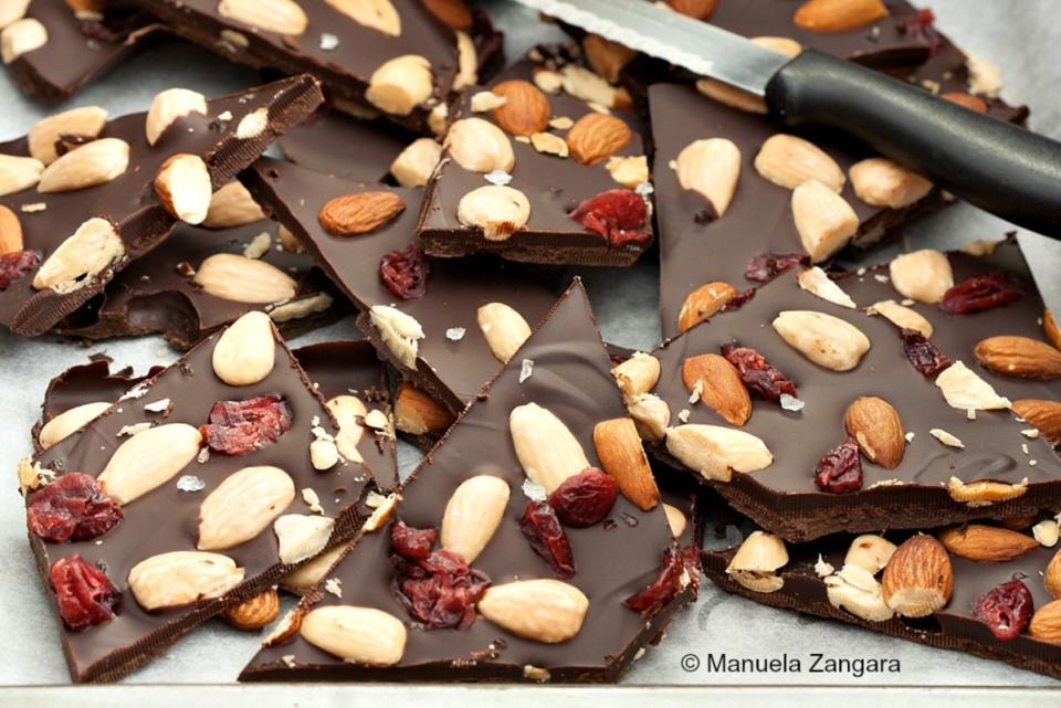 <p>Manu’s Menu</p><p>Fruity, nutty, and supremely chocolately. This chocolate bark is the perfect Christmas gift!</p><p><strong>Get the recipe: </strong><a href="https://www.manusmenu.com/almond-and-cranberry-bark" rel="nofollow noopener" target="_blank" data-ylk="slk:Almond and Cranberry Bark;elm:context_link;itc:0;sec:content-canvas" class="link "><strong>Almond and Cranberry Bark</strong></a></p>