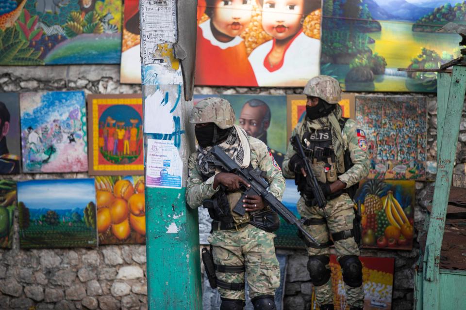 Soldiers patrol in Petion Ville, the neighborhood where Haitian President Jovenel Moise lived in Port-au-Prince. Moise was assassinated July 7 in an attack on his private residence, and first lady Martine Moise was shot and hospitalized, according to a statement from the country's interim prime minister.