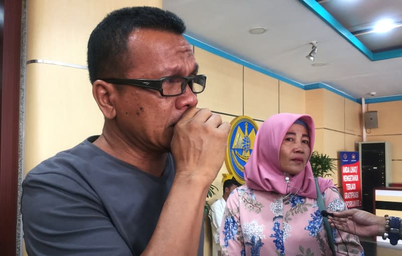 Epi Samsul Komar, 52, a relative of a victim of crashed Lion Air flight JT610 reacts as he speaks to reporters in Jakarta