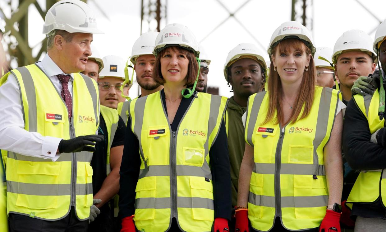 <span>Britain's chancellor, Rachel Reeves, centre, and deputy prime minister, Angela Rayner, right, visit the Oval Village project in London on Monday, after the chancellor announced the first steps the new G<br>government would take to deliver economic growth</span><span>Photograph: Lucy North/AP</span>