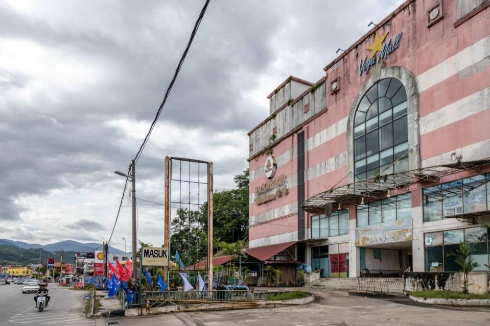 The run-down facade of Vega Mall, which according to locals went bankrupt over five years ago. — Picture by Firdaus Latif
