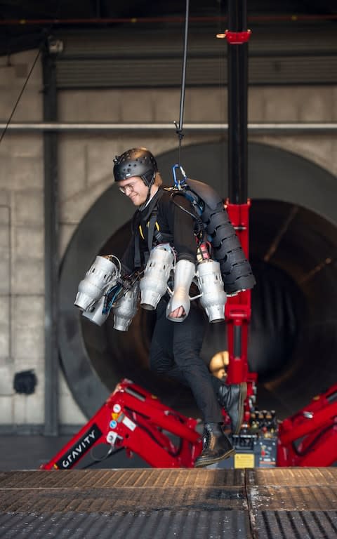 Tom in flight... suspended from a crane - Credit: JULIAN SIMMONDS 