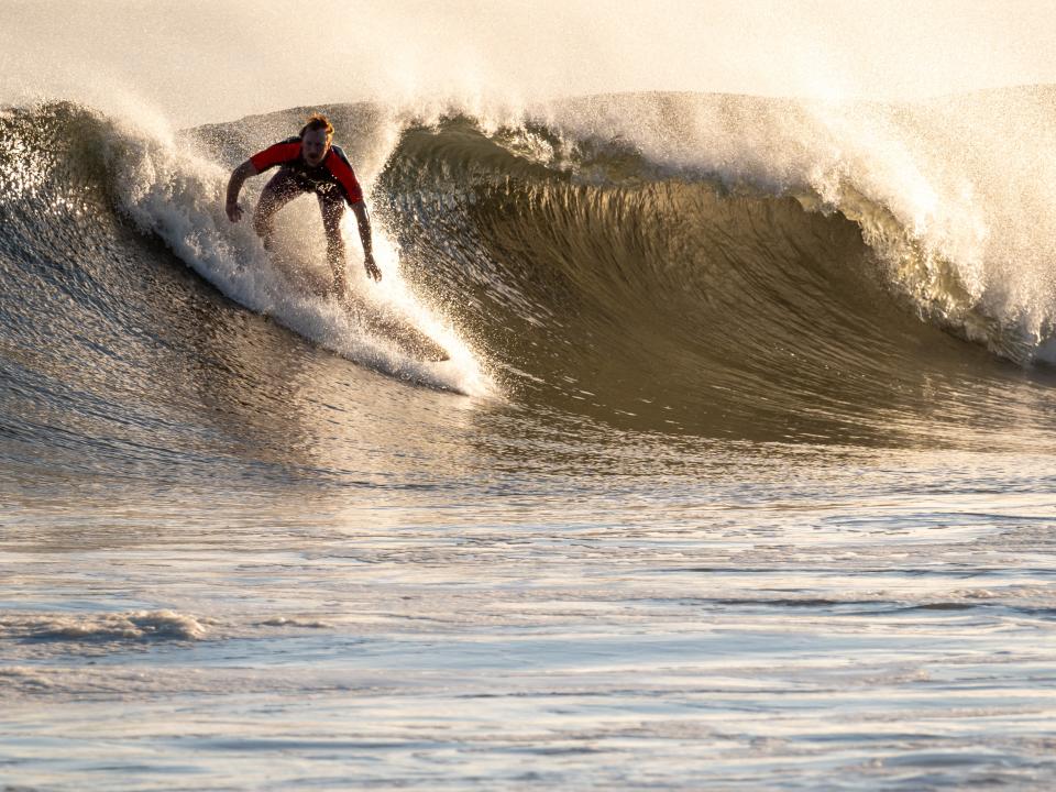 Surfers spend a day at Rockaway Beach as impact from Hurricane Lee delvers large surf and rip tides to much of the Northeast on September 14, 2023 in New York City (Getty Images)
