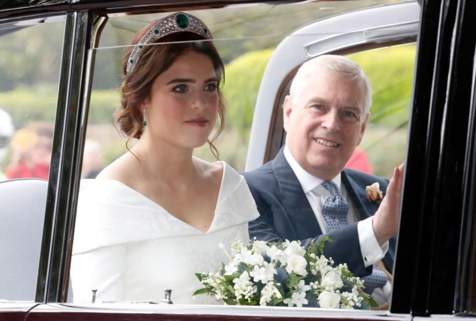 Princess Eugenie departs Windsor Castle for the short drive to St. George's chapel.