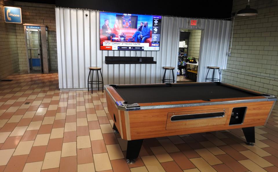 Locals Barbershop Downtown features an area with a television and pool table, with more to come, for customers to enjoy while they wait.