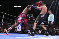 Jermall Charlo, left, fights Juan Macias Montiel during a WBC middleweight world championship boxing match Saturday, June 19, 2021, in Houston. Charlo won the fight. (AP Photo/David J. Phillip)