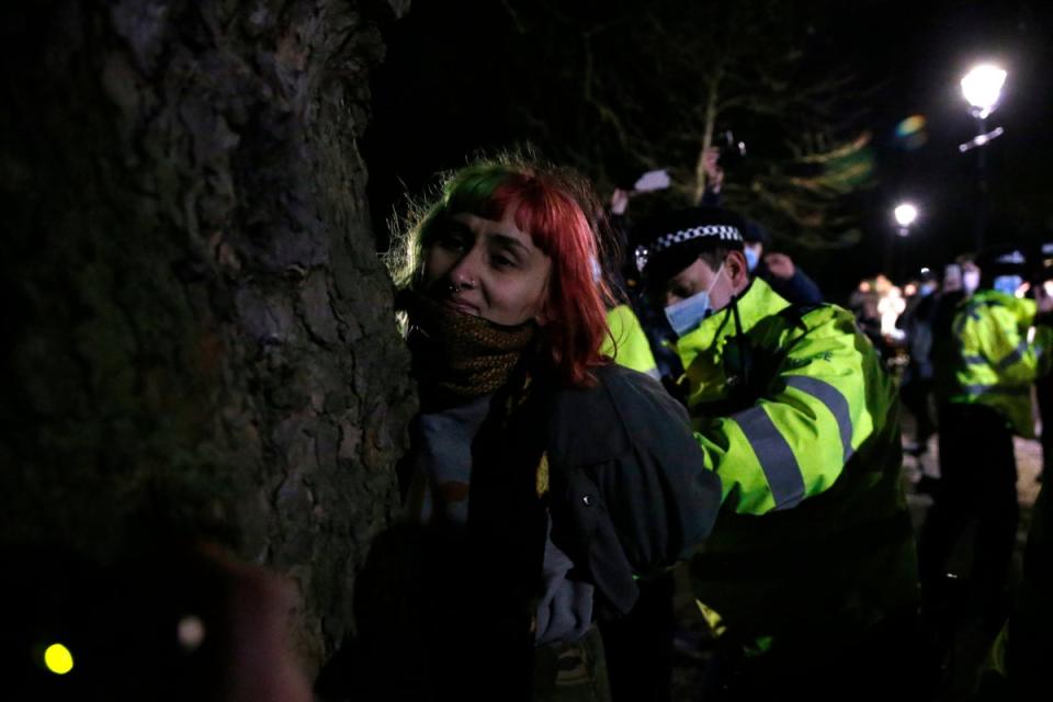 A woman is arrested by police during a vigil for Sarah Everard (Getty Images)