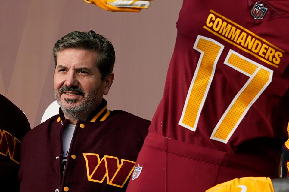 Washington Commanders' Dan Snyder during an event to unveil the NFL football team's new identity, Feb. 2 in Landover, Md.  Snyder and his organization have been the subject of multiple investigations over workplace misconduct and potential financial improprieties.