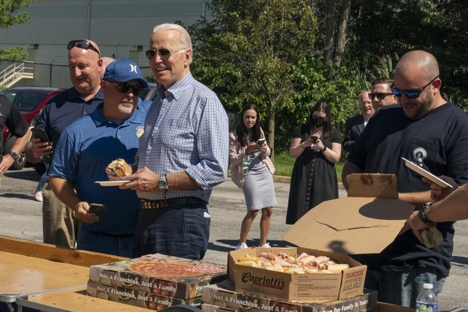 President Joe Biden greets labor union members of the International Brotherhood of Electrical Workers (IBEW) Local 313 in New Castle, Del., commemorating Labor Day, Monday, Sept. 6, 2021. (AP Photo/Manuel Balce Ceneta)