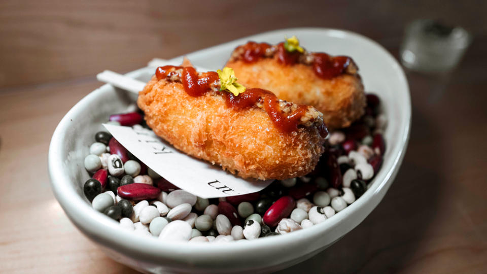 Korean corn dogs, done classy with Dungeness crab, at Kinn - Credit: Jesse Hsu Photography