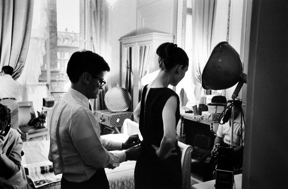 Avedon zipping up Hepburn at The Ritz.