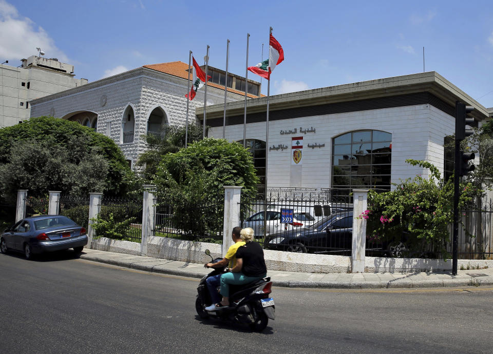 This Thursday, June 20, 2019 photo, shows the municipality building of the Christian village of Hadat, where only Christians can rent or buy property, near Beirut, Lebanon. The town's Muslim ban, imposed years ago, has recently sparked a national outcry. The case reflects Lebanon's rapidly changing demographic make-up against the backdrop of deep-rooted sectarian divisions that once erupted into a 15-year civil war. (AP Photo/Bilal Hussein)