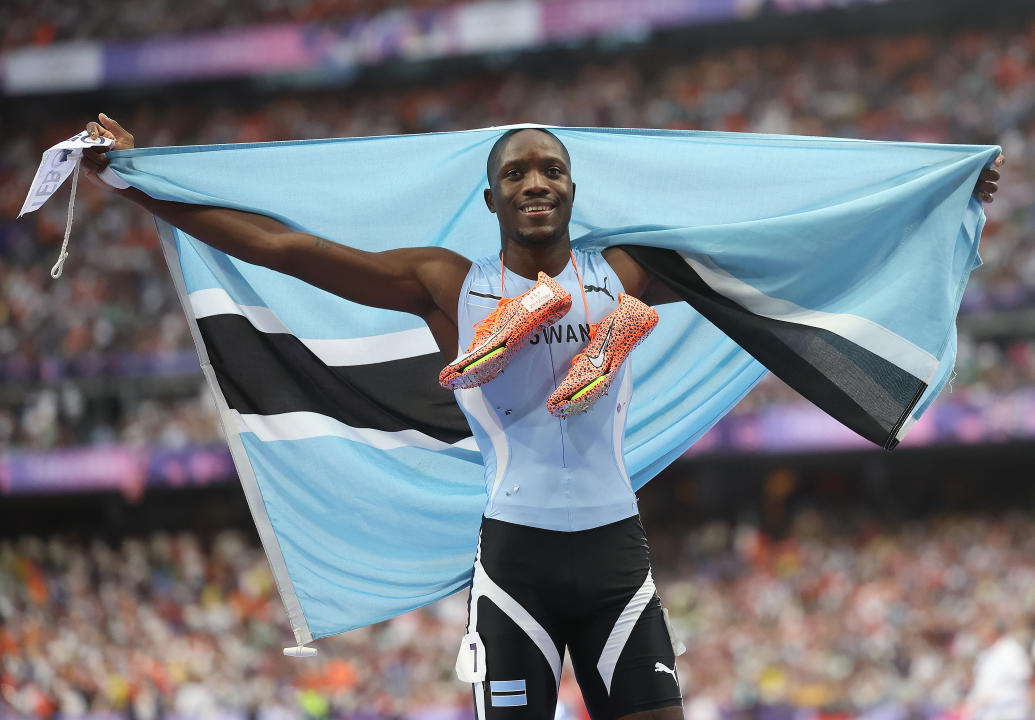 PARIS, FRANCE - AUGUST 08: Letsile Tebogo of Botswana celebrates after he wins the Men's 200m Final on day thirteen of the Olympic Games Paris 2024 at Stade de France on August 08, 2024 in Paris, France. (Photo by Ian MacNicol/Getty Images)