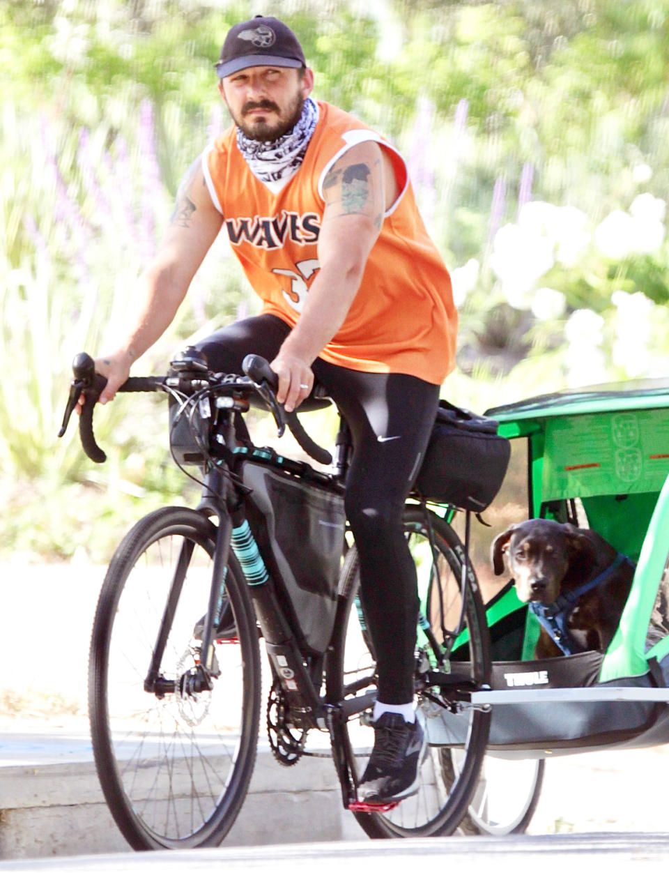 <p>Shia LaBeouf gets some fresh air while taking his dog for a bike ride on Monday in Los Angeles.</p>