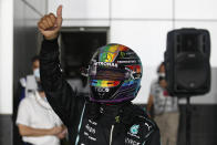 Mercedes driver Lewis Hamilton of Britain reacts after qualifying session qualifying session in Lusail, Qatar, Saturday, Nov. 20, 2021 ahead of the Qatar Formula One Grand Prix. (Hamad I Mohammed, Pool via AP)