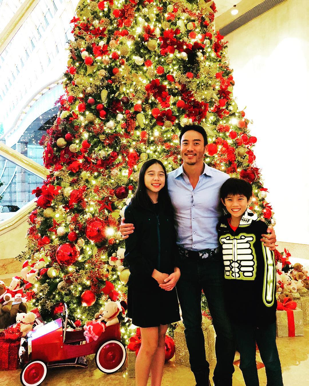 Allan Wu, with his kids Sage and Jonas