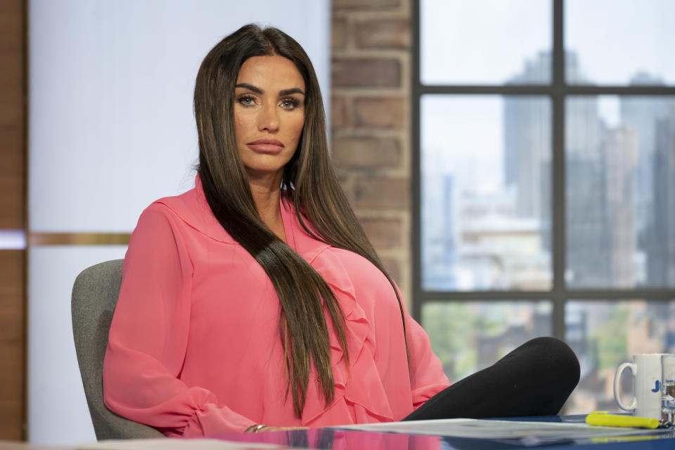 Katie Price told Jeremy Vine in March 2023 that she is never satisfied with her appearance. (PA/Alamy)