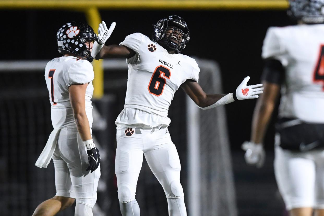 Powell’s Steven Soles celebrates a sack during a game between Catholic and Powell at Catholic on Oct. 21, 2022. Soles joined Kentucky's 2024 recruiting class Aug. 2.