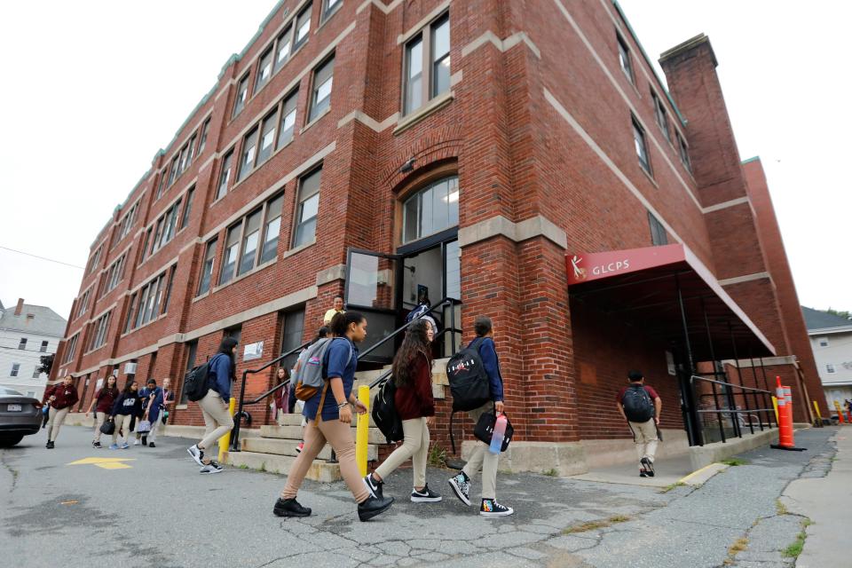 Students arrive for school as the Global Learning Charter Public School in New Bedford celebrates its 20th anniversary.