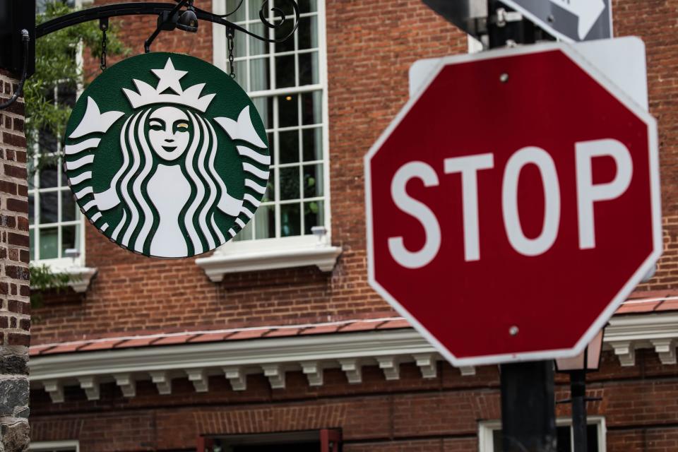 WASHINGTON, USA - MAY 29: A logo of the Starbucks is seen in Washington, United States on May 29, 2018. American coffeehouse chain Starbucks will close more than 8,000 of its stores in the U.S. on May 29 afternoon to conduct racial-bias education for its employees. (Photo by Yasin Ozturk/Anadolu Agency/Getty Images)