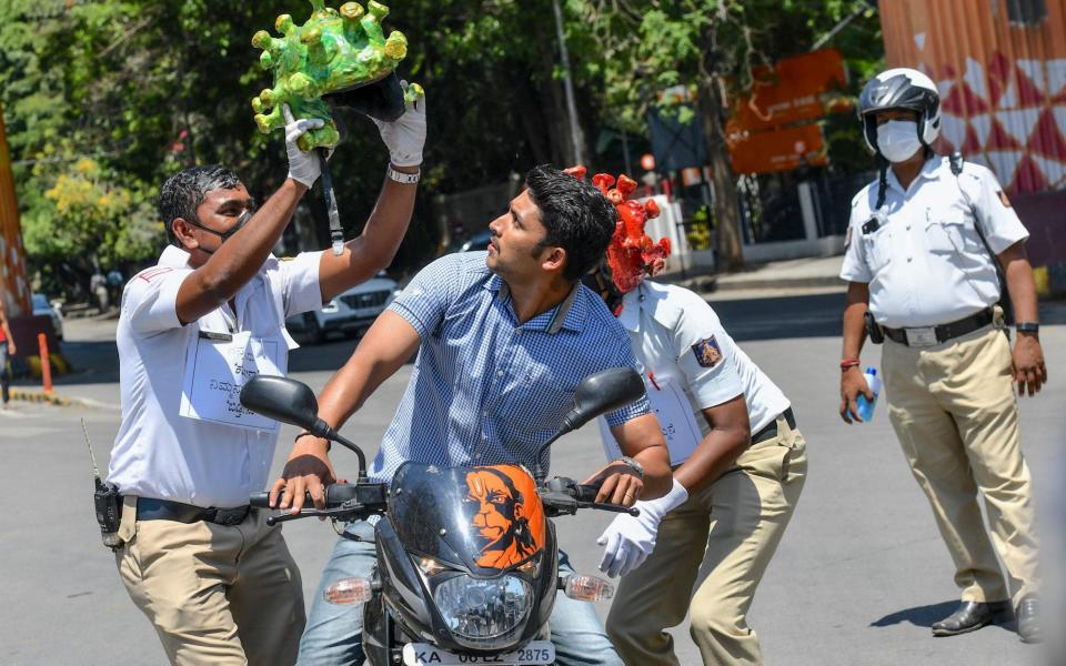 A hands-on approach to educating the public in Bangalore - MANJUNATH KIRAN/AFP