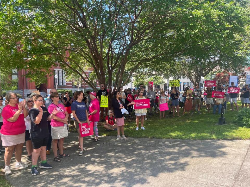 Abortion rights supporters protest against Senate Bill 20, the 12-week abortion ban that was passed by the General Assembly, during a rally at Innes Park in Wilmington, N.C. on Saturday, May 13, 2023.