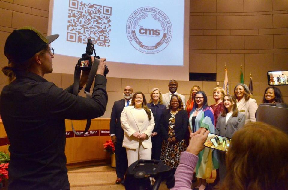 CMS board members pose for a picture with newly elected members on Tuesday, Dec. 12, 2023.