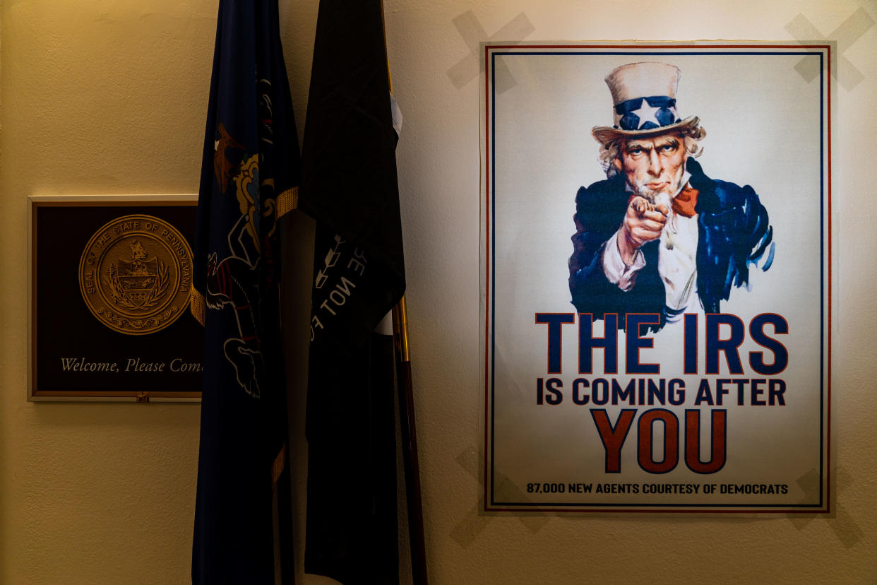 WASHINGTON, DC - NOVEMBER 14: A poster claiming The IRS is coming after you is seen outside of the office of Rep. Mike Kelly (R-PA) in the Longworth House Office Building on Capitol Hill on Monday, Nov. 14, 2022 in Washington, DC. Tomorrow, House Republicans will hold elections for leadership positions in the 118th Congress.  (Kent Nishimura / Los Angeles Times via Getty Images)