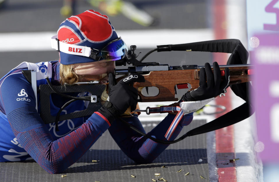 Norway's Tora Berger shoots during a training session at the Biathlon stadium, at the 2014 Winter Olympics, Wednesday, Feb. 5, 2014, in Krasnaya Polyana, Russia. (AP Photo/Lee Jin-man)