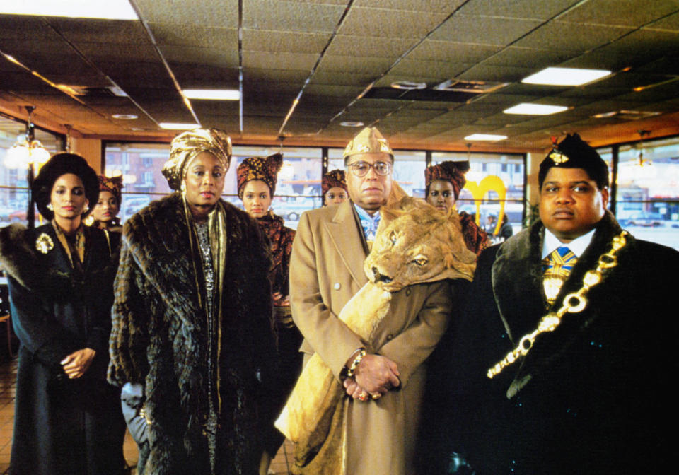 From left: Sheila Johnson, Madge Sinclair, James Earl Jones and Paul Bates in a scene from Coming to America.