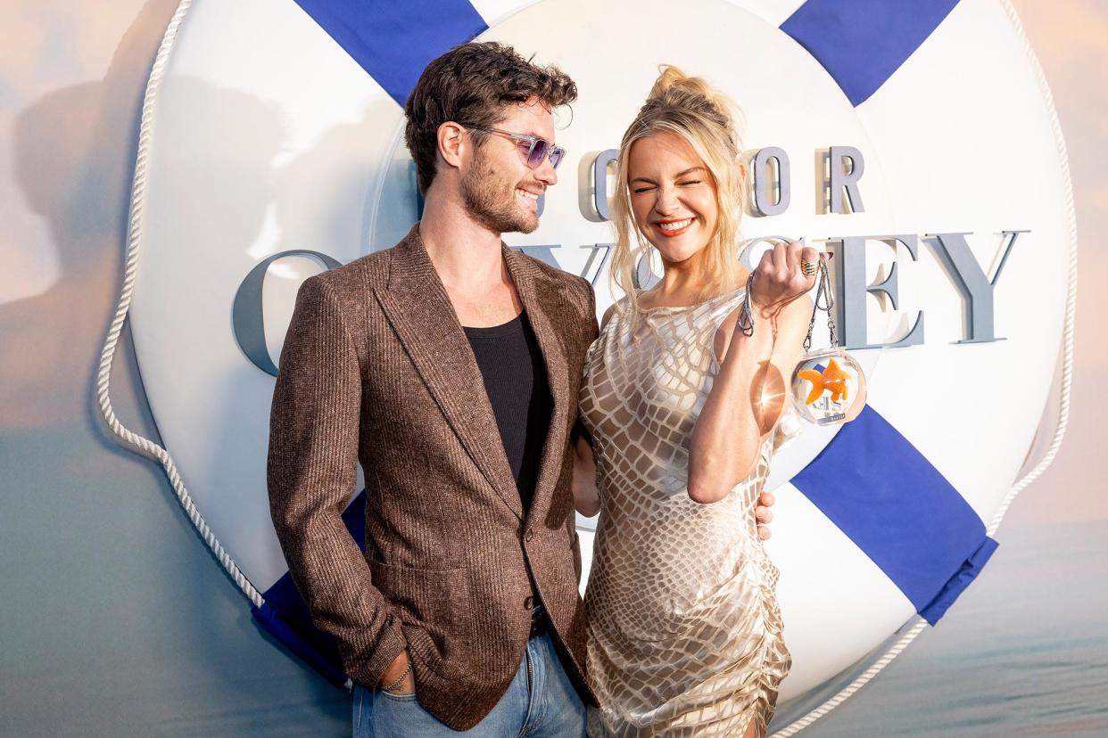 Kelsea Ballerini Carries Fishbowl Purse on Red Carpet With Chase Stokes