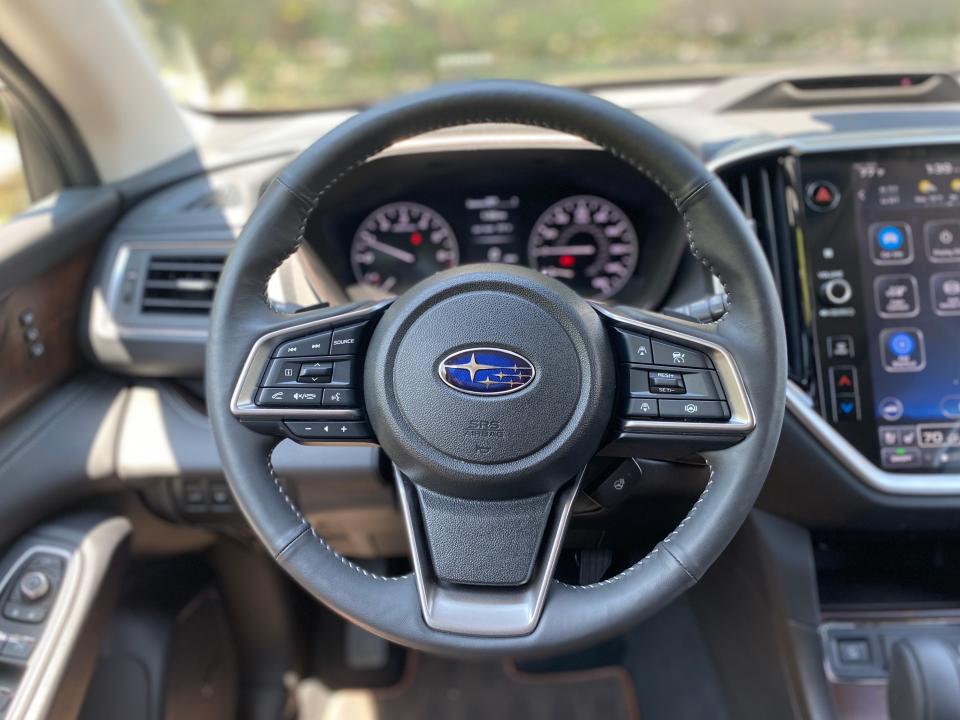 The Subaru Ascent's steering wheel with infotainment and driver assistance system controls.