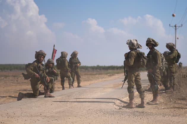 Israeli soldiers patrol next to communities near the Israeli-Gaza border.