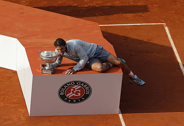 Emotional Rafael Nadal wins his 9th French Open title over Novak