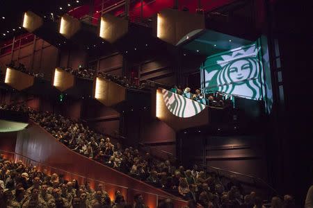 Audience members are pictured during the company's annual shareholder's meeting in Seattle, March 18, 2015. REUTERS/David Ryder