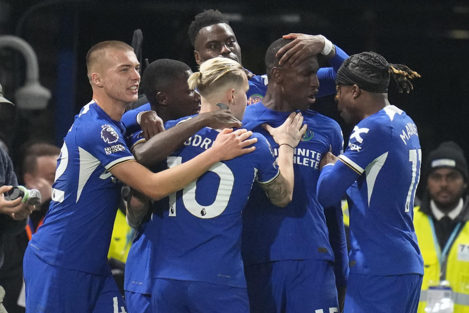 Chelsea's Nicolas Jackson, centre right, celebrates after scoring his side's second goal during the English Premier League soccer match between Chelsea and Tottenham Hotspur at Stamford Bridge stadium in London, Thursday, May 2, 2024. (AP Photo/Kirsty Wigglesworth)