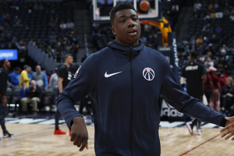 Washington Wizards center Thomas Bryant (13) in the first half of an NBA basketball game Sunday, March 31, 2019, in Denver. (AP Photo/David Zalubowski)