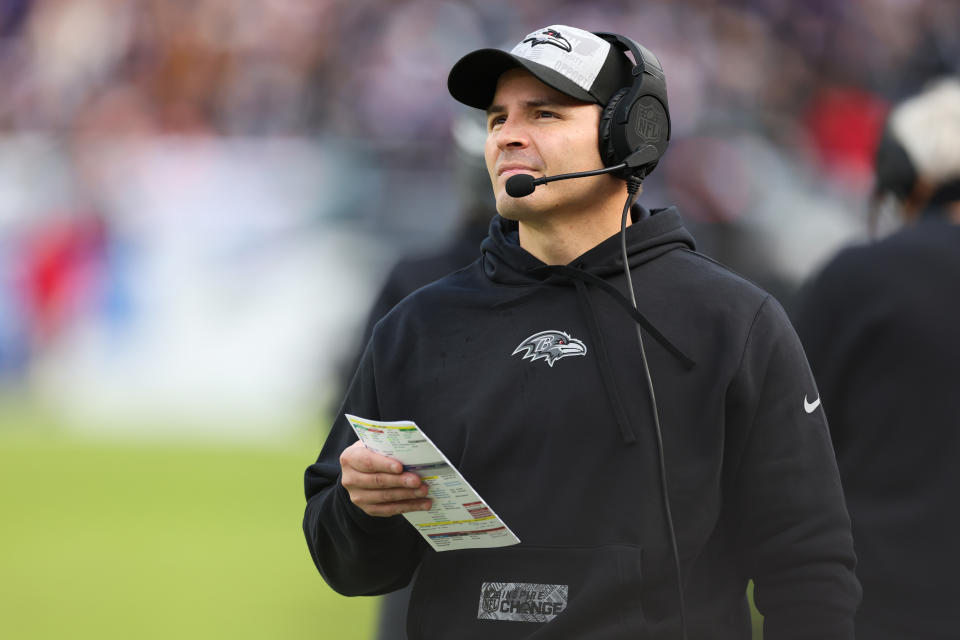 BALTIMORE, MARYLAND - DECEMBER 31: Defensive coordinator Mike Macdonald of the Baltimore Ravens looks on during the first half of the game against the Miami Dolphins at M&T Bank Stadium on December 31, 2023 in Baltimore, Maryland. (Photo by Todd Olszewski/Getty Images)