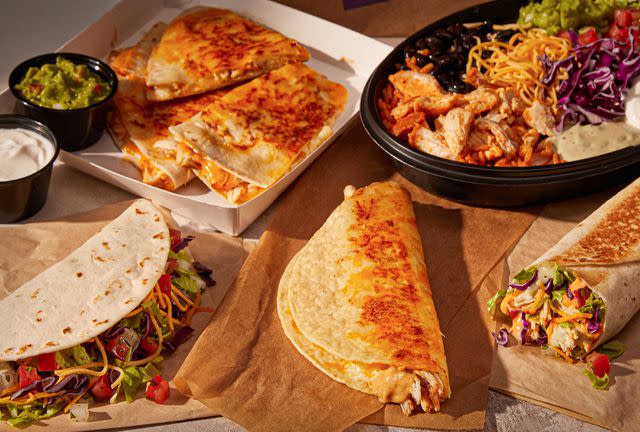 <p>Taco Bell</p> Taco Bell is offering BOGO specials on its new Cantina chicken menu if you spend at least $15.