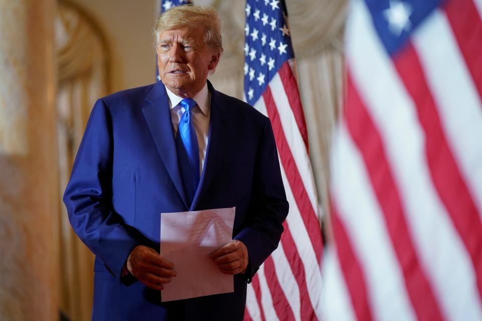 FILE - Former President Donald Trump arrives to speak at Mar-a-lago on Election Day, Nov. 8, 2022, in Palm Beach, Fla. Trump will be joined by two of his highest-profile South Carolina supporters at the first public campaign event of his 2024 White House bid later this month in the early voting state. Gov. Henry McMaster and U.S. Sen. Lindsey Graham will be with Trump on Jan. 28 at the Statehouse in Columbia, where he will unveil his South Carolina leadership team. . (AP Photo/Andrew Harnik, File)