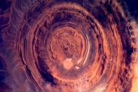 Dutch astronaut Andre Kuipers snapped a huge, copper-toned rock formation in Mauritania, West Africa, from the International Space Station. Photo credit: Nasa